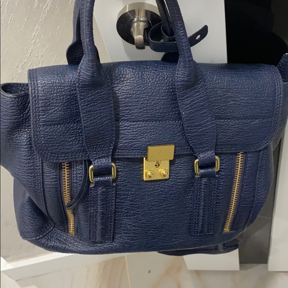 3.1 Phillip lam in blue good condition